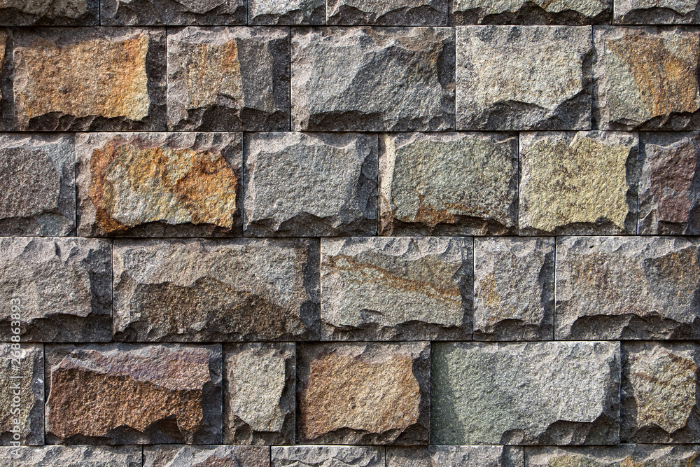 Background, texture, laying of a multi-colored natural stone and blocks. Background, texture, laying of a multi-colored natural stone and blocks.