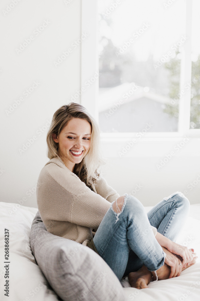 Young woman in bright modern home Young woman in bright modern home