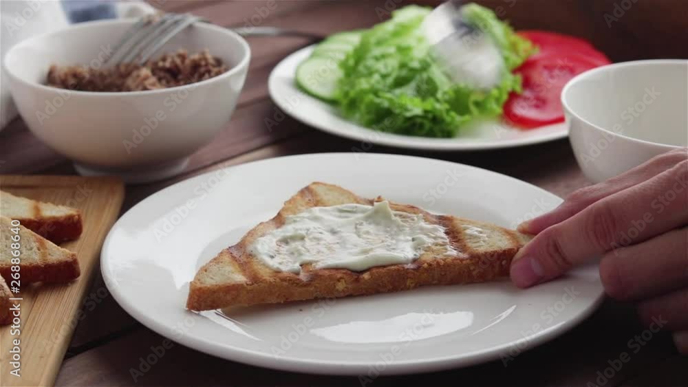spreading sauce on toast bread making sandwich spreading sauce on toast bread making sandwich