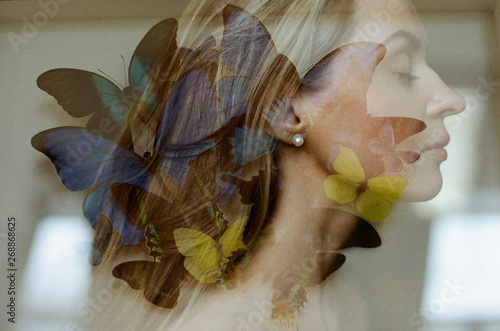 Double exposure portrait of a woman with butterflies photo