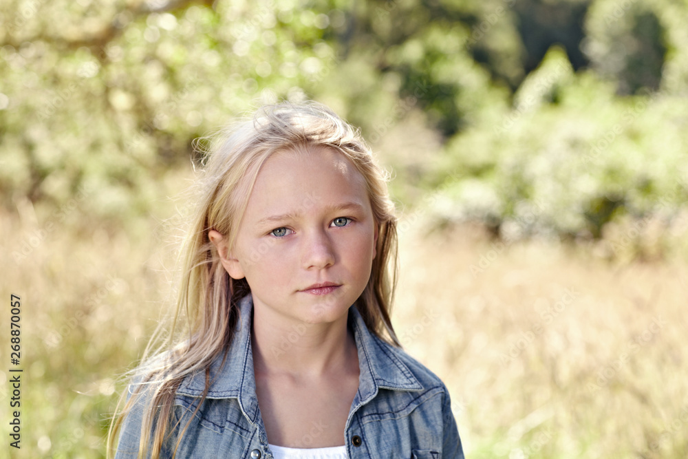 Portrait of little girl with blonde hair outdoors Portrait of little girl with blonde hair outdoors