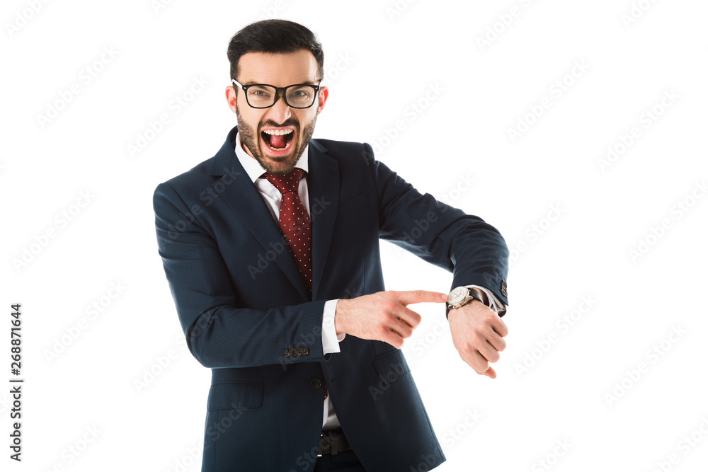 angry businessman quarreling while looking at camera and pointing at watch isolated on white angry businessman quarreling while looking at camera and pointing at watch isolated on white
