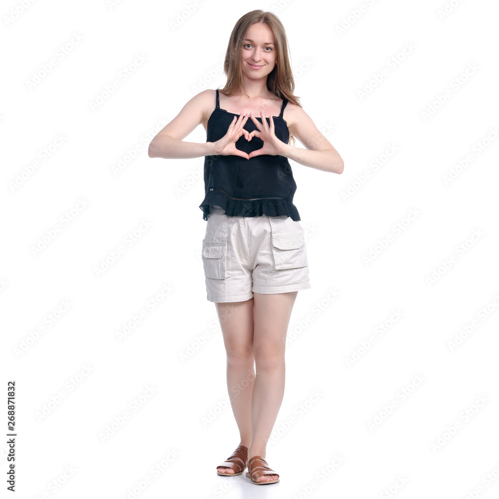 Woman in shorts showing heart love on white background isolation Woman in shorts showing heart love on white background isolation