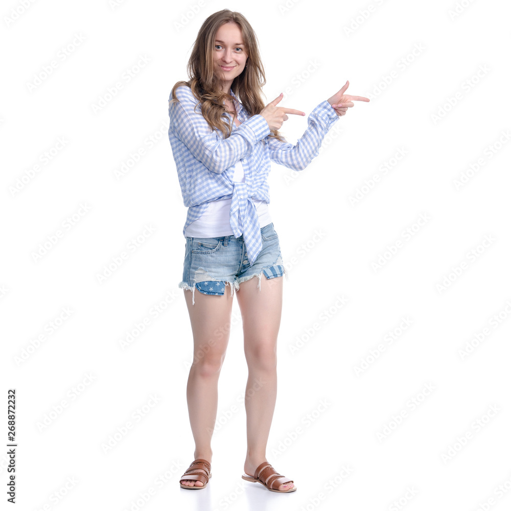 Woman in denim shorts showing pointing on white background isolation Woman in denim shorts showing pointing on white background isolation