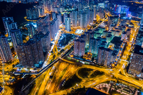  Top view of Hong Kong city at night © leungchopan