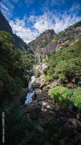 mountain and tall waterfall, Ravana Falls in Sri Lanka