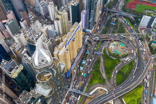  Drone fly over Hong Kong city © leungchopan