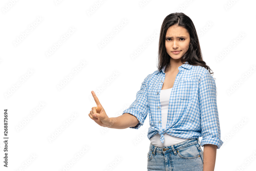 skeptical girl pointing with finger Isolated On White with copy space skeptical girl pointing with finger Isolated On White with copy space