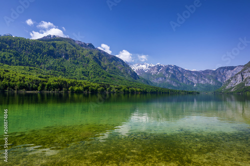 Lake Bohinj in Slovenia  beauty in nature. Colorful summer on the Bohinj lake in Triglav national park Slovenia  Alps  Europe. Mountain Lake bohinj in Julian Alps  Slovenia