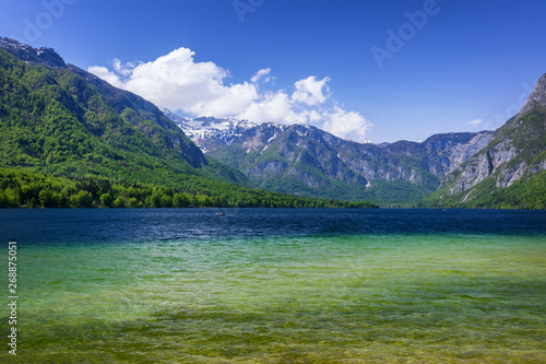 Fototapeta Naklejka Na Ścianę i Meble -  Lake Bohinj in Slovenia, beauty in nature. Colorful summer on the Bohinj lake in Triglav national park Slovenia, Alps, Europe. Mountain Lake bohinj in Julian Alps, Slovenia