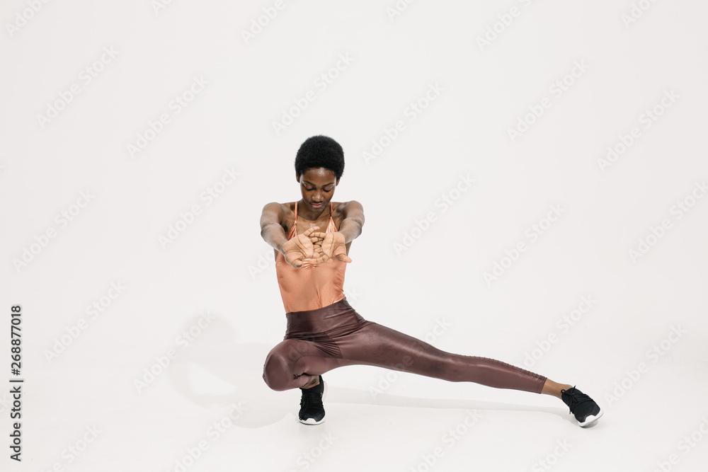 Stylish black sportswoman on white Stylish black sportswoman on white