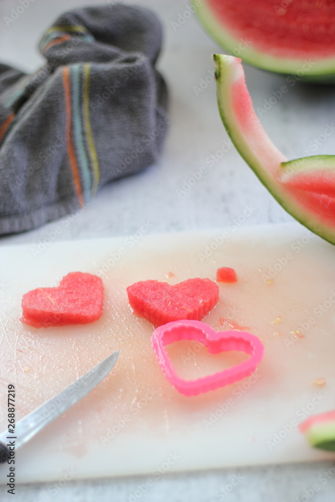 Obraz premium Watermelon cut into a heart shape