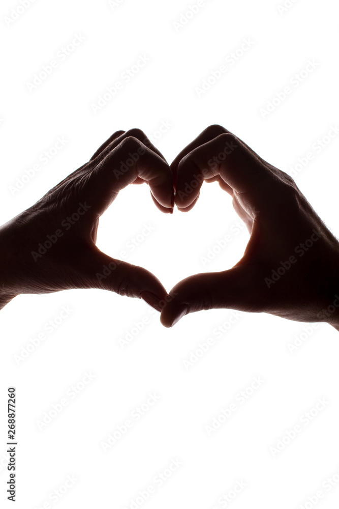 Fototapeta premium Female and male hands as a symbol of the heart