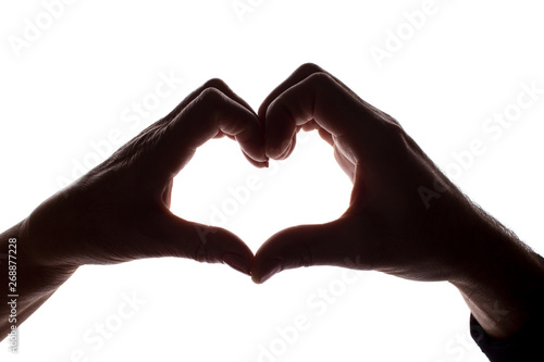 Female and male hands as a symbol of the heart