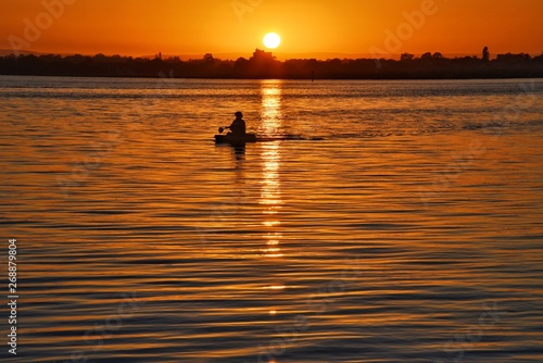 Boating in sunset