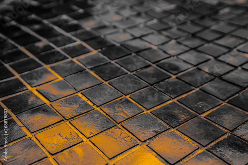 Beautiful closeup textures abstract tiles and black gold and yellow color glass pattern wall background and art wallpapers