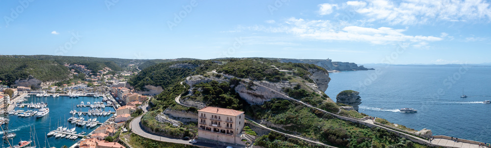 Panoramic view over the bay and port of Bonifacio city in Corsica, France.