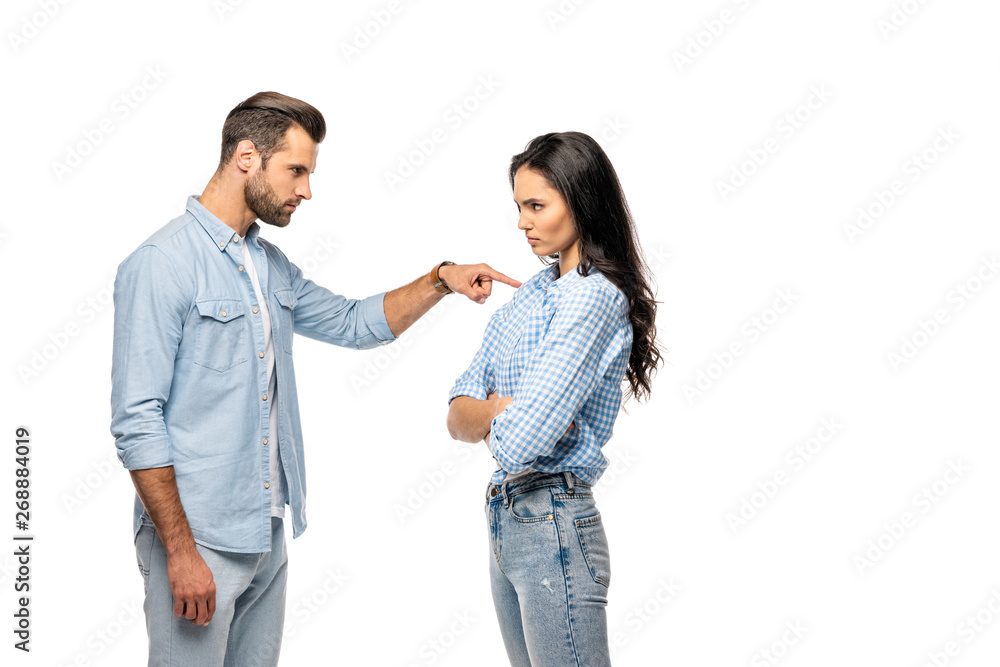 angry man pointing with finger at young woman Isolated On White angry man pointing with finger at young woman Isolated On White