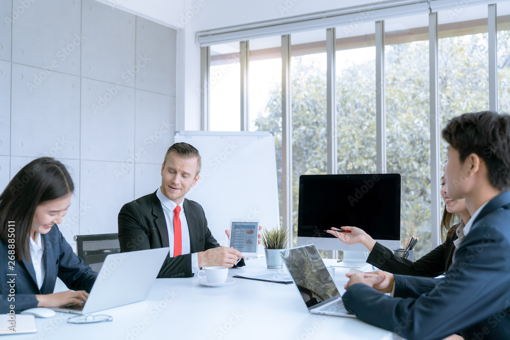 Young business people are presented marketing work project to the customer in meeting room office Young business people are presented marketing work project to the customer in meeting room office