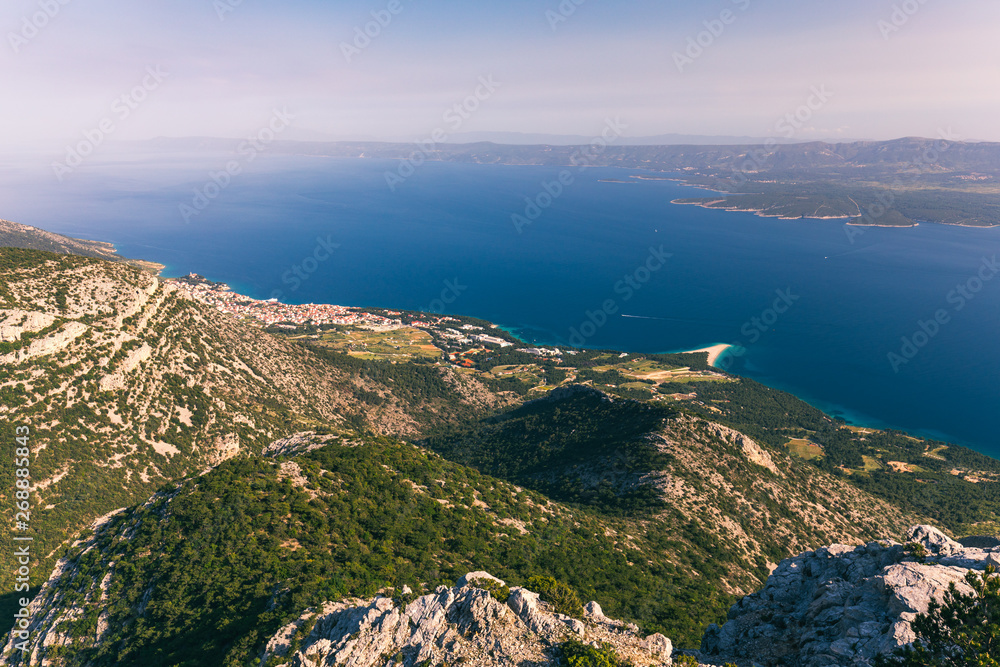 Bol on Brac island panoramic aerial view, Dalmatia, Croatia. Town of Bol from Vidova Gora aerial view, Island of Brac, Dalmatia, Croatia.