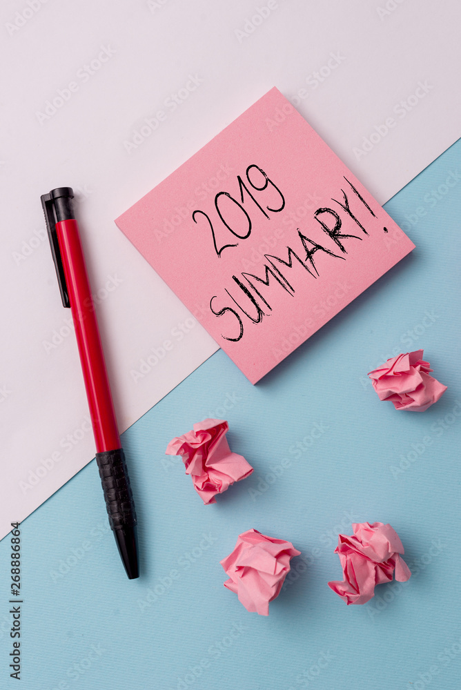 Writing note showing 2019 Summary. Business concept for summarizing past year events main actions or good shows Note papers and stationary placed sideways on top of softhued backdrop Writing note showing 2019 Summary. Business concept for summarizing past year events main actions or good shows Note papers and stationary placed sideways on top of softhued backdrop
