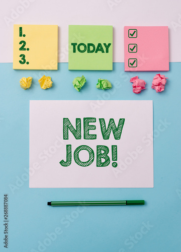 Writing note showing New Job. Business concept for recently having paid position of regular employment Note papers and stationary placed sideways on top of softhued backdrop © Artur