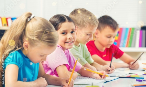 School Children in the Classroom Writing /