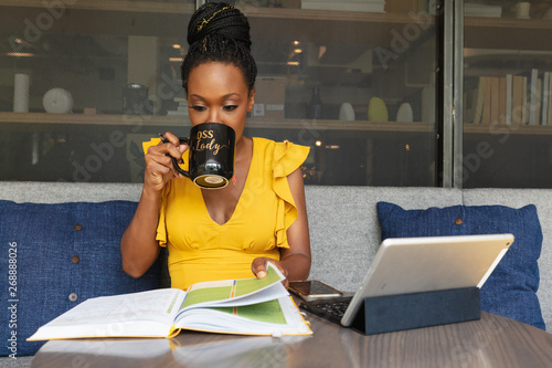 Businesswoman drinking out of boss lady mug