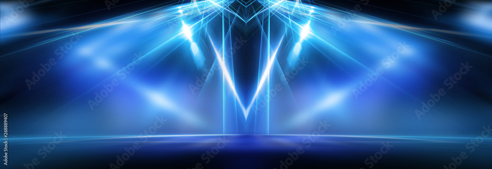 Obraz premium Pusta scena, niebieski neon, abstrakcyjne niebieskie tło. Promienie reflektorów, światło, abstrakcyjny tunel, korytarz.