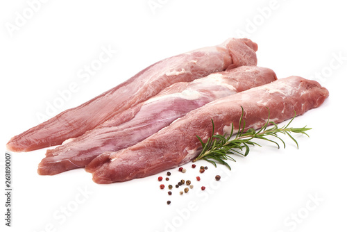 Pork fillet tenderloin with rosemary, raw meat, close-up, isolated on white background