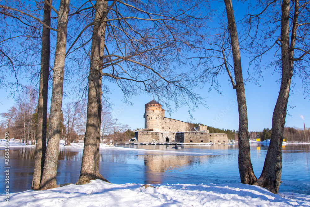 View to Olavinlinna Castle and lake from the shore, Savonlinna, Finland