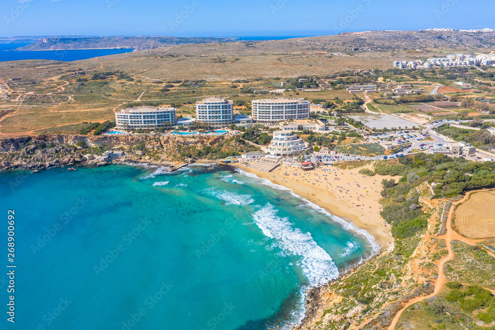 Aerial view of a Golden Bay beach on Tuffieha region, Malta.