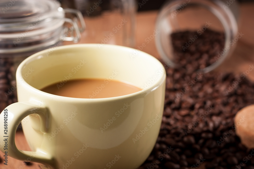 Fototapeta premium image of coffee cup on wood