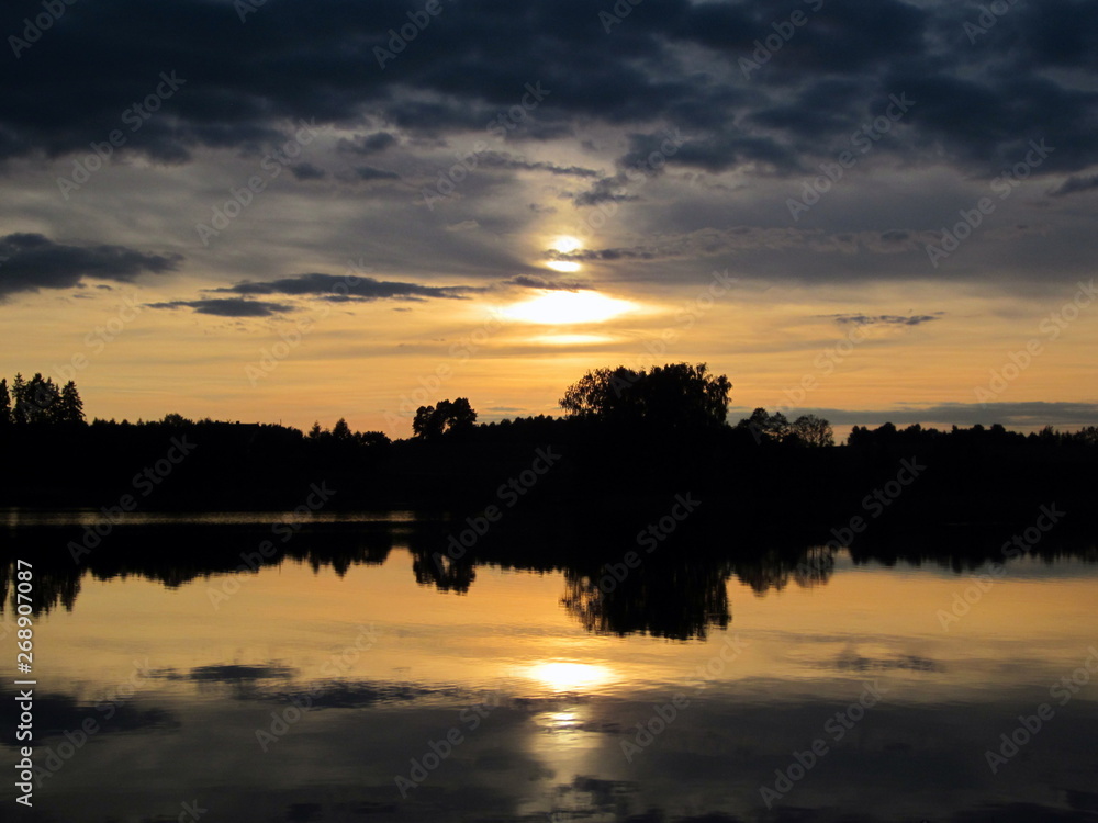 Beautiful sunset at the lake. Poland, Masuria - the land of a thousand lakes.