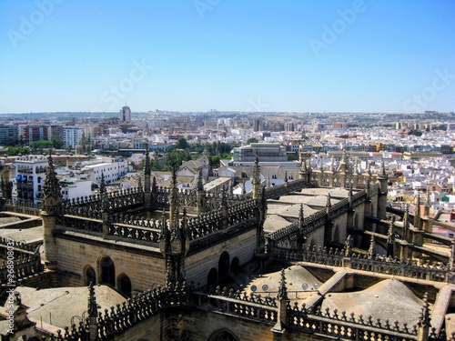 Aerial view of Seville city and Cathedral of Saint Mary of the See in Seville seen from the Giralda tower. Seville, Andalusia, Spain, Europe.  © PaulSat
