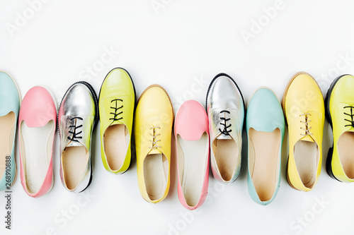 Stylish female spring or autumn shoes in various colors. Beauty and fashion concept. Flat lay, top view