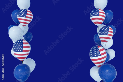 4th July Independence day USA celebration. Balloons with United States of America Flag and national colors on blue background.Copy space for text-3d render