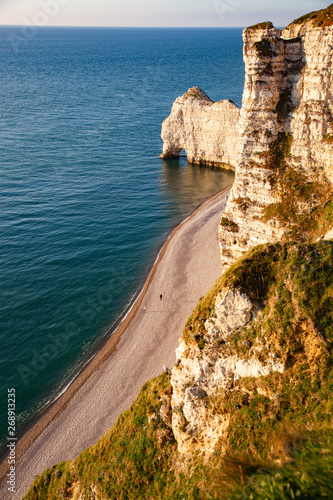 coastal landscape along the Falaise d'Aval the famous white cliffs of Etretat village, Normandie, France