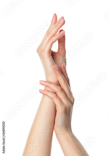 Woman with soft and silky skin on white background  closeup of hands