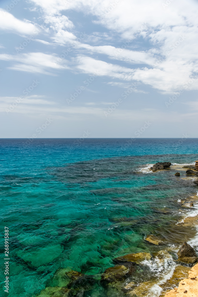 Obraz premium Light sea surf on the Mediterranean coast.