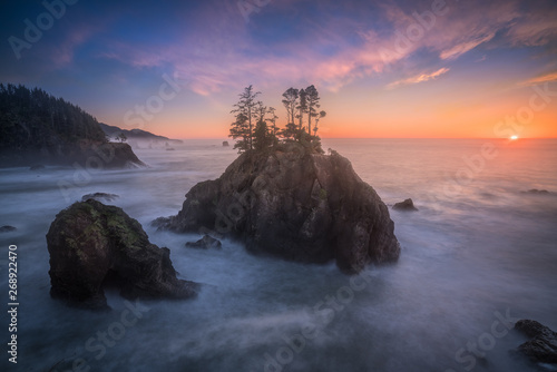 The last minute sunset and soft ocean of Oregon coast photo