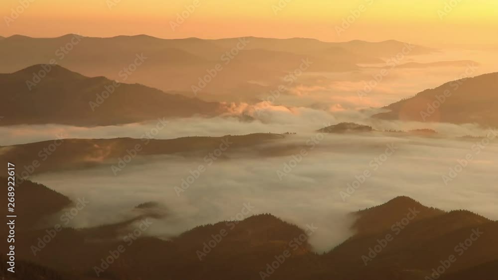Misty dawn in the mountains. Beautiful landscape Misty dawn in the mountains. Beautiful landscape