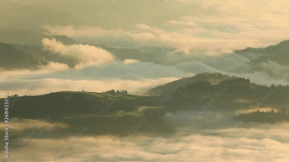 Misty dawn in the mountains. Beautiful landscape Misty dawn in the mountains. Beautiful landscape