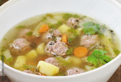 Italian Wedding Meatball Soup. soup in a beautiful white bowl