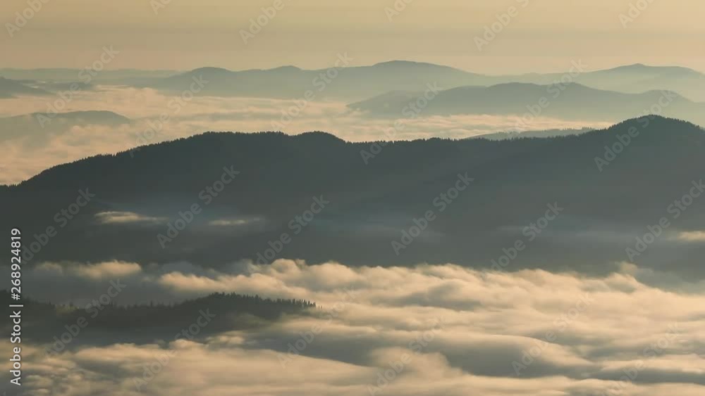 Misty dawn in the mountains. Beautiful landscape Misty dawn in the mountains. Beautiful landscape