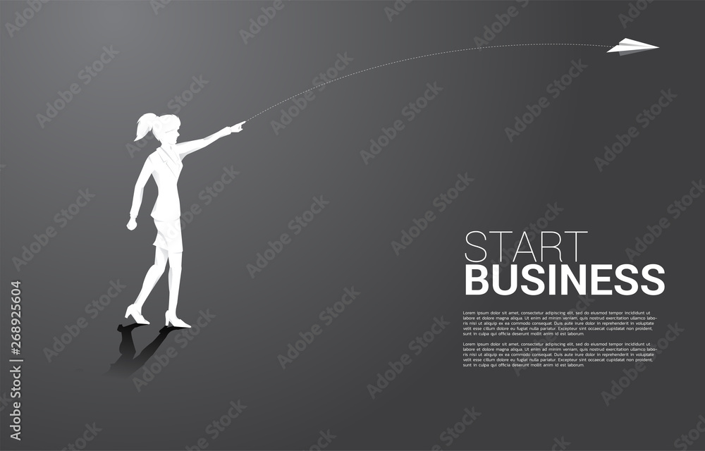 Naklejka premium silhouette of businesswoman throw out origami paper airplane. Business Concept of start business and entrepreneur