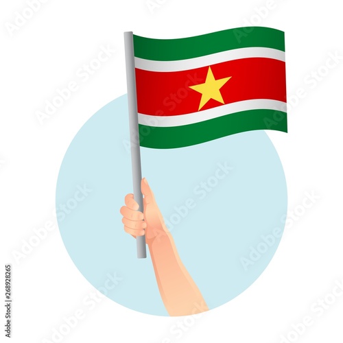 Suriname flag in hand icon © Visual Content