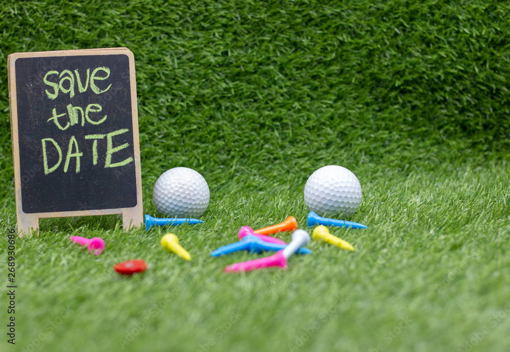 Naklejka premium Golf Save the date with golf balls and tee on green grass