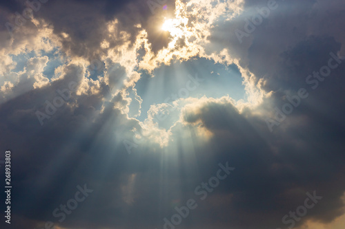 The sun light passes through the clouds after rain.