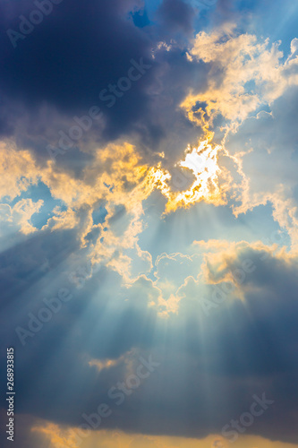 Fotografie The sun light passes through the clouds after rain.